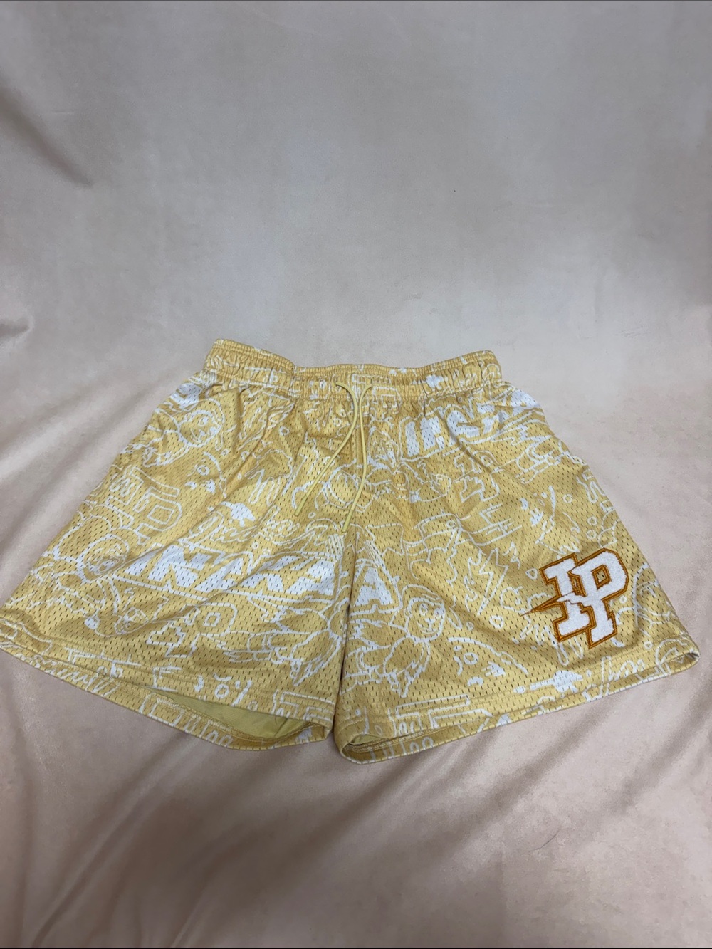 Inaka Power Yellow Mesh Graphic Athletic Shorts with Orange-Trim 'P' Patch